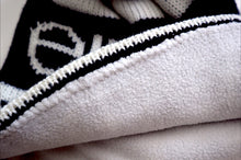 Load image into Gallery viewer, Fleece lining of a knit beanie