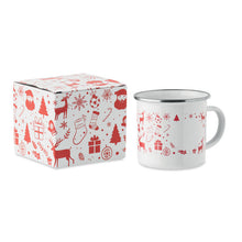 Load image into Gallery viewer, A white enamel mug with a red Christmas-themed pattern, shown next to its matching patterned gift box on a white background.
