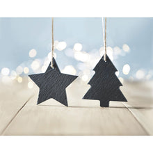 Load image into Gallery viewer, Black star and tree-shaped ornaments hanging against a blurred light background
